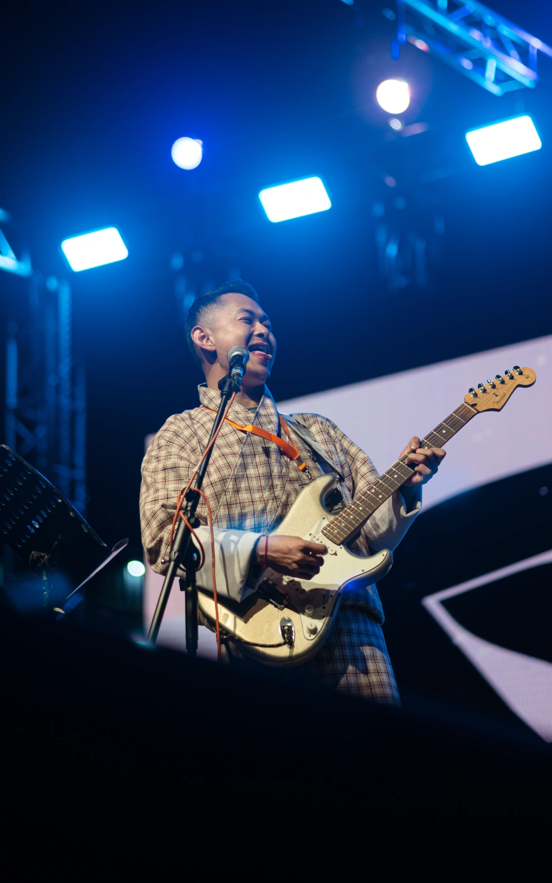 Photograph of the Lead Vocalist and Guitarist of The Paktso Boiz band at the Asia Rock Fest Bhutan 2025