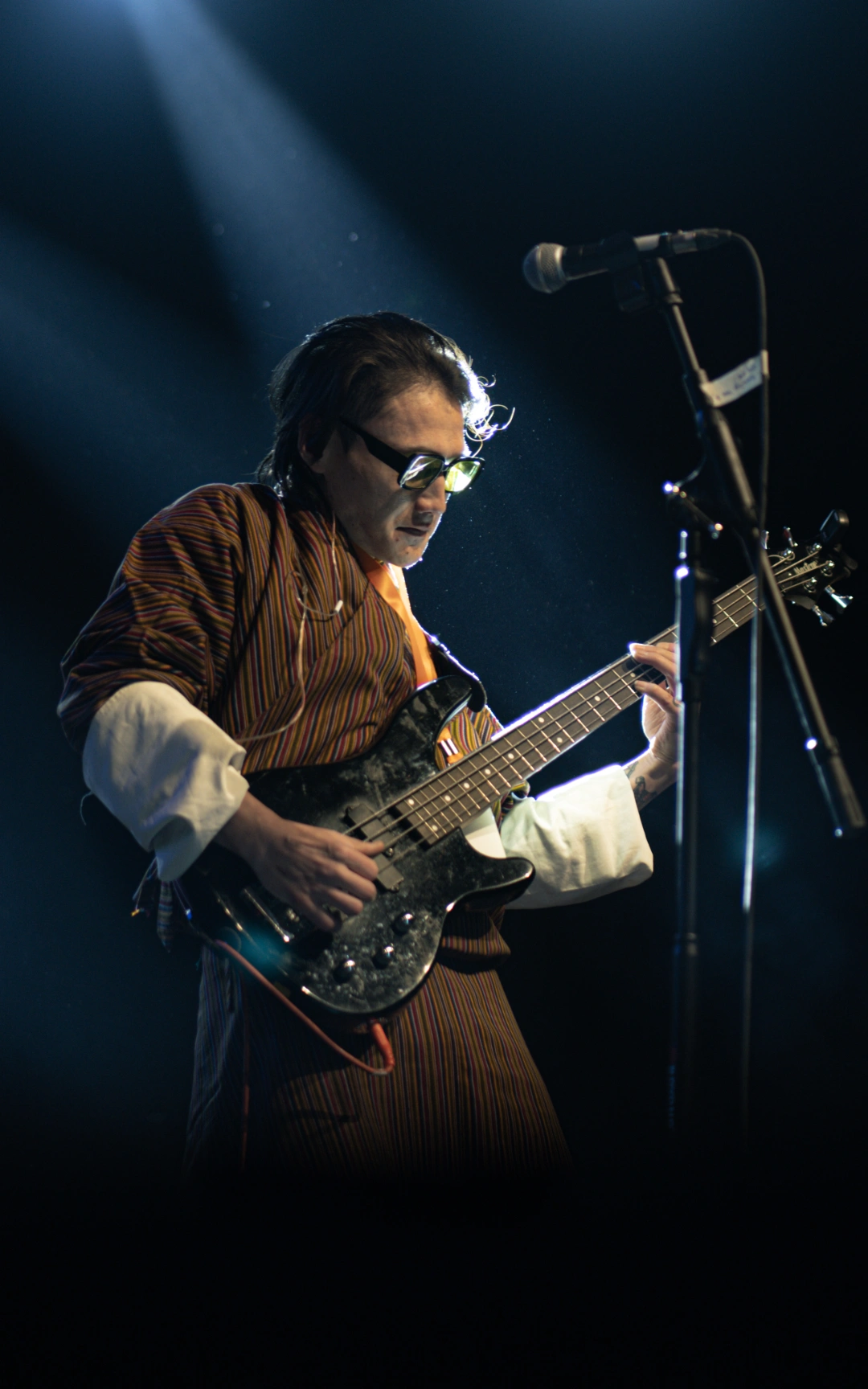 Photograph of the Bassist of The Backbeads band at the Asia Rock Fest Bhutan 2025