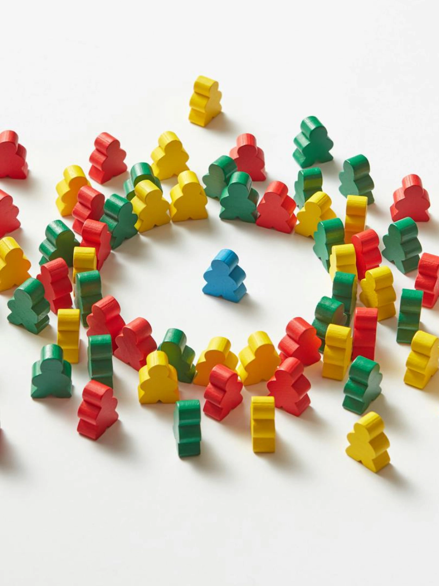 Image of a person standing out in front of similar crowd.